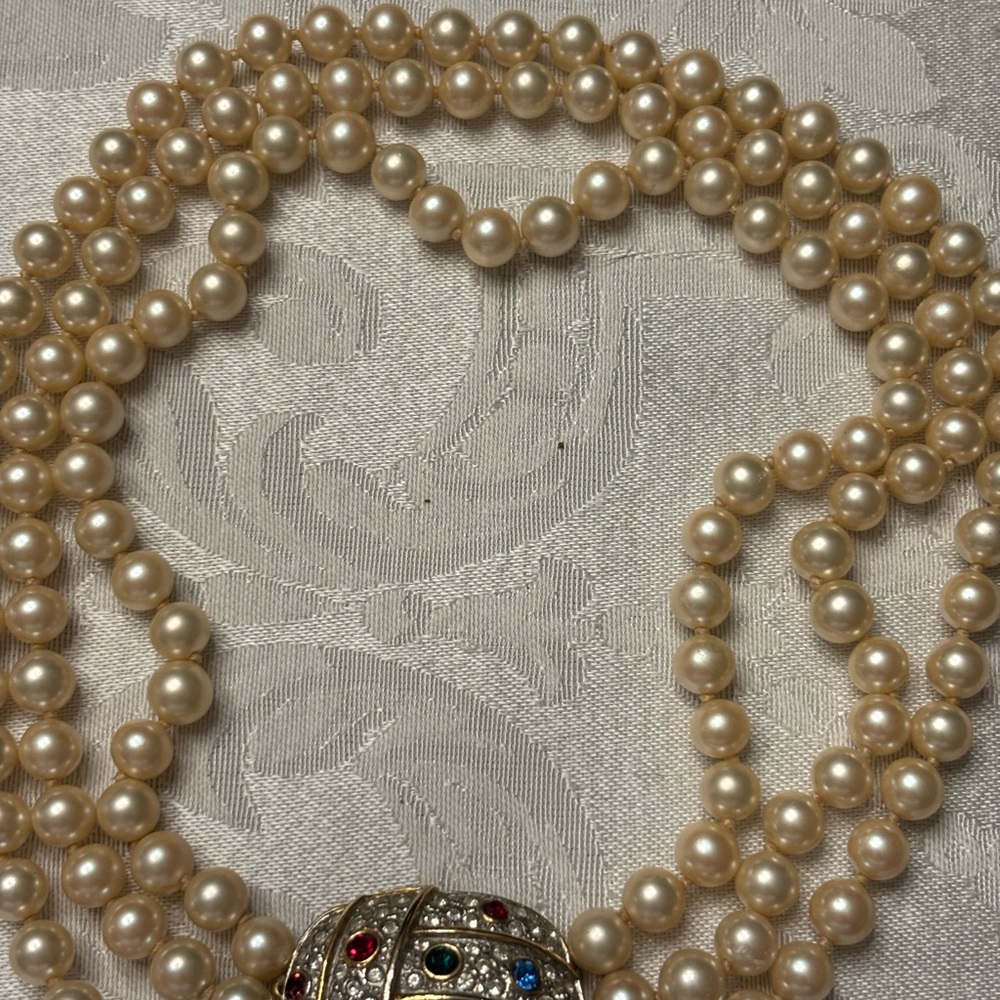 Classic Cream faux pearl Multi-Strand Necklace with Ornate Clasp. Knotted.